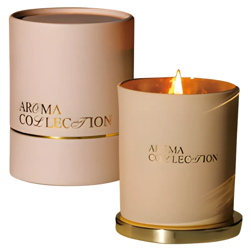 VELA AROMÁTICA COLOR ROSA CON DETALLES DORADOS X3 UNIDADES